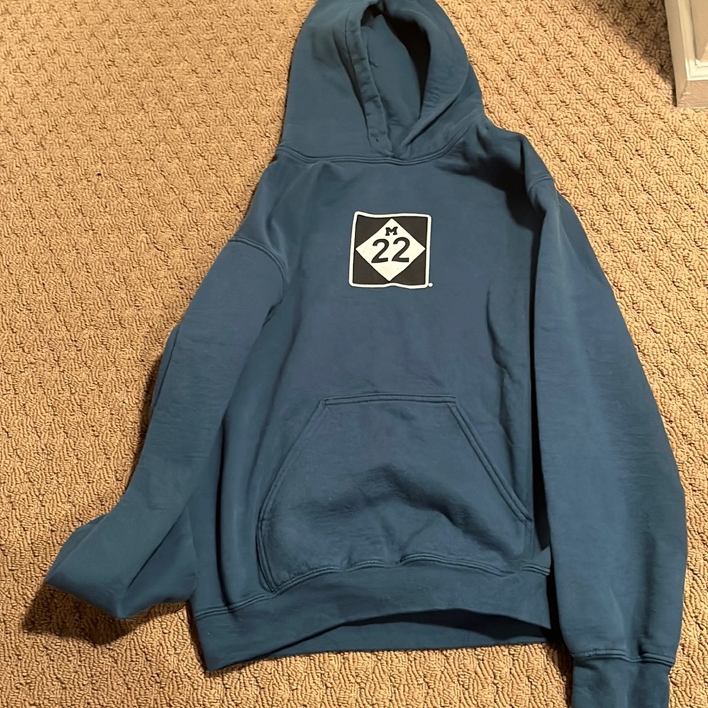 M 22 Teal sweatshirt. Small. Okay condition.